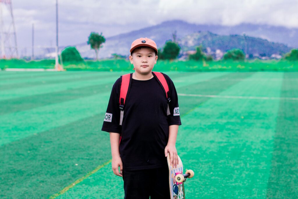 A teen enjoying an outdoor activity, promoting a healthy balance between screen time and time spent in the real world.
