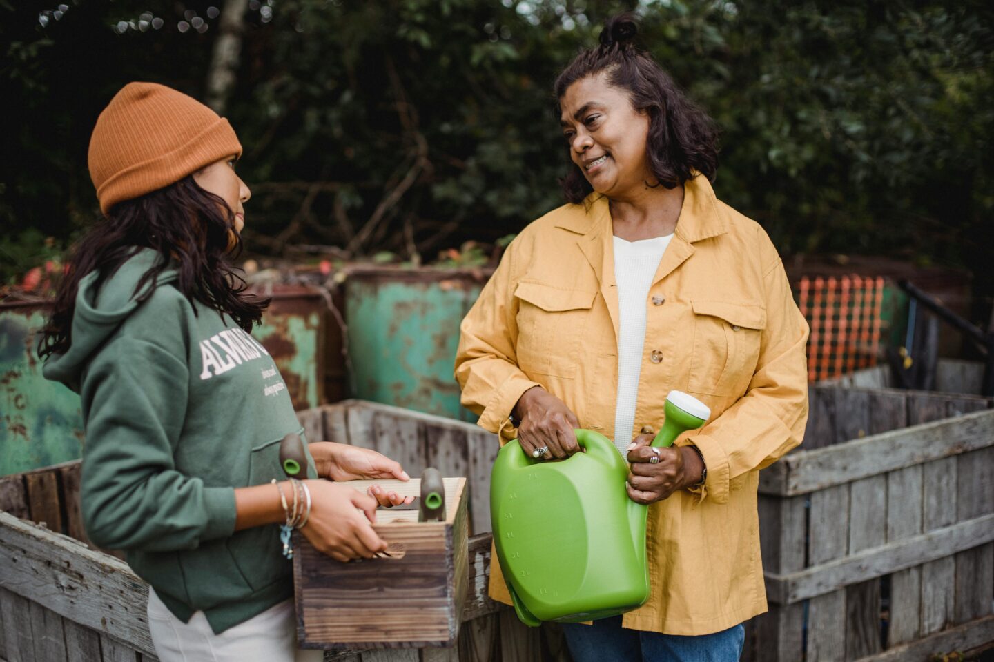 A parent and teen working together on a creative activity, such as journaling or problem-solving, symbolizing emotional resilience and growth.