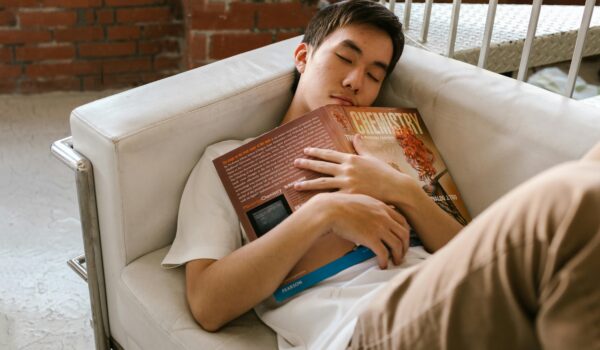 A teenager sleeping peacefully, supporting healthy mental and emotional development